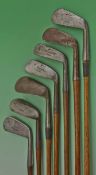 Composed set of 7x Tom Stewart made irons and putters for various club makers to incl long irons,