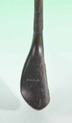 McEwan dark stained curved face beech wood long spoon c1885 fitted with full wrap-over brass sole