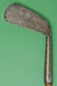 An early blacksmith made dish faced lofting iron c1880 with 4.75” flat hosel still retaining part of