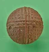 An interesting small and unusual pattern red gutty bramble golf ball c1890 – with 3 groups of 3