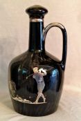 Fulper dark blue glass and silver overlay musical whisky jug c1920s - decorated with a golfing and a