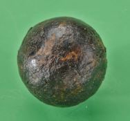 A small smooth gutty golf ball c1850 – retaining good shape