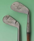 2x Tom Stewart Morris style round toed irons to incl Mongrel Iron mussel back stamped A L Johnson