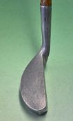 Unusual alloy mallet head putter -with an elongated head stamped to the crown Braid Special and to