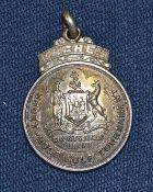 1928 Bruntsfield Link white metal golf medal – the obverse is embossed with a crest and “Short