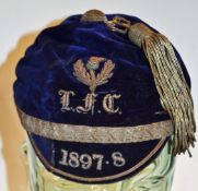 1897/98 Scottish rugby club cap – dark blue velvet cap with silver braid embroidered letters IFC,
