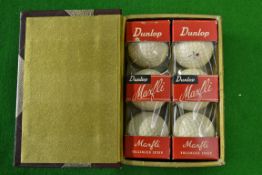 An early Dunlop Faux book for 6 golf balls – together with 6x unused Dunlop Maxfli goilf balls in