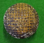 Silver Town line mesh pattern guttie golf ball c1890s – retaining some original white finish – faint