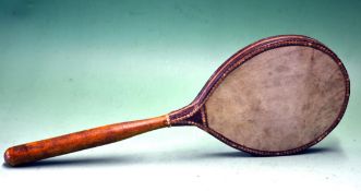 Late Vic battledore/ping pong bat – with vellum panels and wooden handle – overall 15.5" (g)