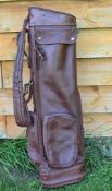 Leather golf bag fitted with 2x large side pockets and an individual ball pocket – zips need