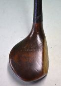 Fine R Forgan, St Andrews crown model brassie - with good maker’s mark below the full length leather