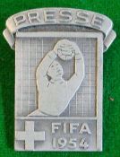 1954 Football World Cup Press Badge: White metal badge with diving Goalkeeper and FIFA 1954 beneath,