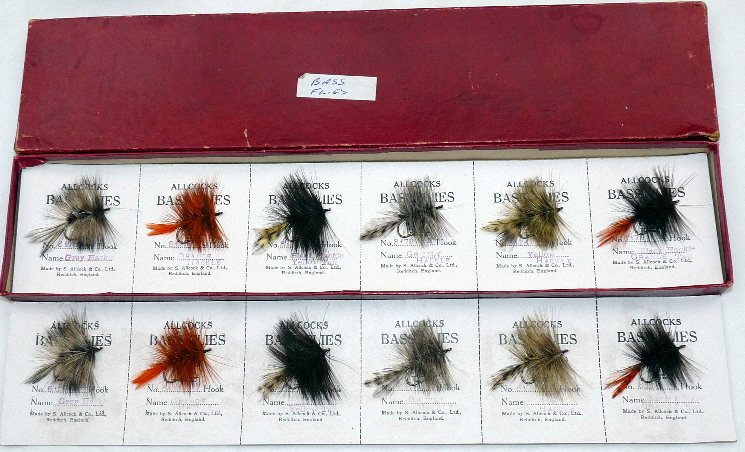 FLIES: Collection of 12 Allcock Bass flies all size 8, varied patterns, attached to two 6 strip