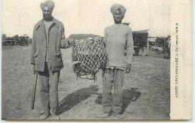 India WWI postcard – Sikhs Soldiers holding a shell vintage postcard showing two 45th Sikh