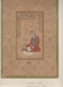 Indian Miniature painting on an manuscript leaf showing a seated figure consulting a sacred text and