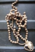 Gandhi’s Prayer beads a set of wooden prayer beads which belonged to Gandhi From the house in