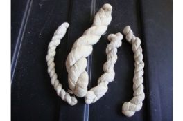 Gandhi a group of white cords made from handspun yarn by Gandhi during his time at Juhu. Approx 34