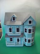 Wooden Dolls House: Made from a Quality Kit painted in Light powder Blue and White with opening