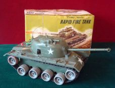 Tomy / Matic No 64 Rapid Fire Tank: Battery Operated Plastic Tank shoots cars, smokes realistically,