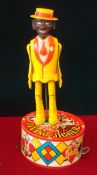 Marx Toys Mechanical Jiving Toy, Approximately 10" high including the base. Base is made of tinplate