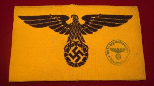 WW2 German Civil Service Armband: This is a black machine woven spread wing eagle on golden yellow