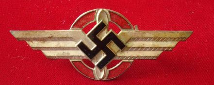 WW2 German NSFK Enamel Cap Badge: Die struck Visor Hat Badge winged propeller with Red enamelled