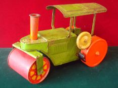 Large Tin Plate Steam Roller: 32cm Green and Orange having overhead canopy with some kind of gears