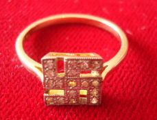 German 10ct Gold Swastika Ring: Small Ladies ring having Swastika design with White Stones (possibly