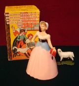 Welsotoys " Mary Had A Little Lamb" : Clockwork plastic Mary figure is pink, white, blue, supplied