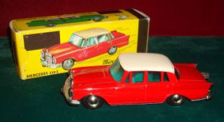 Schuco – Micro-Racer 1038 – Mercedes 220S: Red saloon body – White roof – green plastic windows –