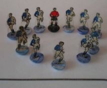 Newfooty Celluloid Team: Blue & White Halved Shirts with White Shorts and Red Goalkeeper with Wire