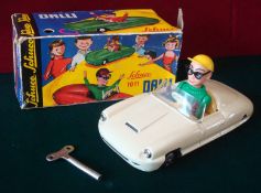 Schuco No.1011 Dalli tinplate clockwork Car with driver: Cream, with plastic driver, red shirt,