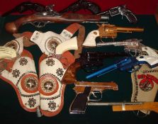 Collection of Children`s Cowboy Guns and Pistols: To include Guns Kid Carson, Peacemaker, Pony