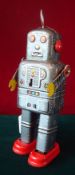 Mechanical Walking Space Man Robot: made from Metal construction in Gum Metal Grey with flat arms