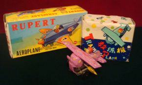 Marx Toys " Rupert" Friction Drive Aeroplane 1970s: Orange and blue plastic, clear windshield,