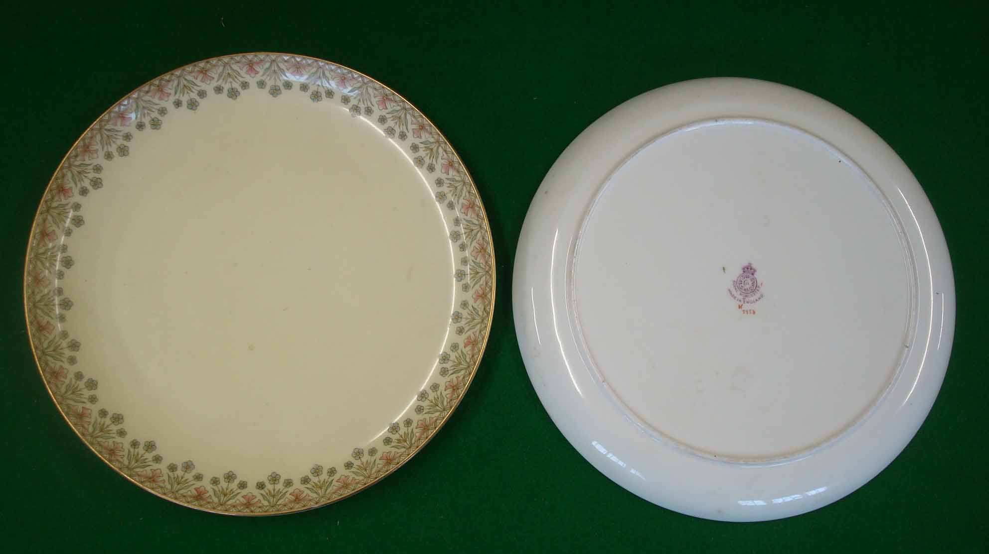 2 Early 20th Century Royal Worcester Pottery Plates: Both having floral design borders with lilac