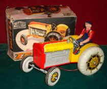 Mettoy tinplate clockwork Tractor: Scarce colour variation is yellow, with grey plastic engine