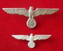 WW2 German Cap Eagles: Two White Metal Eagles with Swastika below both having blade fittings 2 sizes
