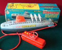 Marx Toys (Japan) Atomic Submarine: Battery powered remote control tinplate model is grey, with