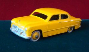 Dinky Toys 139a Ford Sedan: Yellow, Silver Radiator and Yellow Hubs and White Wall Tyres (G)