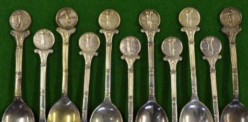 10x matching silver plated golfing teaspoons 8 x with embossed circular finials of lady golfers