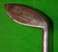 Fine John Fernie Elliptical style mashie niblick – with a very pointed toe, c/w the Anderson Arrow