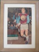 Bobby Moore Framed Autographed Print: Centre pages taken from the Charles Buchan Magazine full