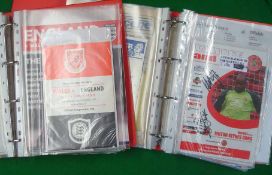 2 Binders of Football Programmes: To include 25 Wales home and away matches from 1958 some