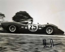 Chris Amon signed Ferrari photograph: signed in black felt tip pen - overfall 24 x 19cm