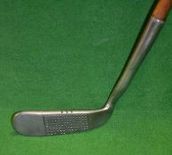 Scarce and unusual unnamed Smith’s Pat anti shank putter - with a concentric face – 6” hosel and