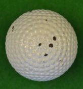 The Lion bramble pattern guttie golf ball – retaining much of the white paint finish