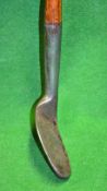 Interesting and unusual dished faced smf sand iron with very dropped toe, flat face/straight sole (