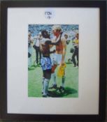 Pele Signed Photograph: A colour picture of the famous shot of Moore & Pele after the 1970 World Cup