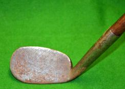 Gourlay Pat hosel notch mashie – stamped Reg no 10745 c/w the original full length hide grip with